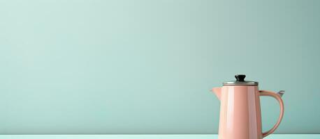 Photo of a pink tea pot on a table with empty space for text or other elements with copy space