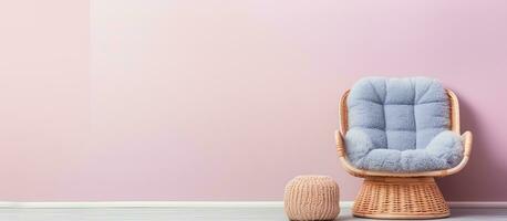 Photo of a blue chair and small stool against a pink wall with empty space for text or design with copy space