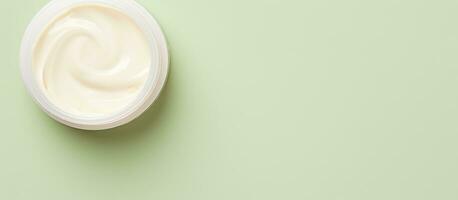 Photo of a jar of cream on a vibrant green background with plenty of space for text or graphics with copy space