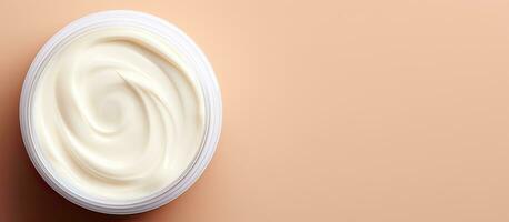 Photo of a jar of yogurt on a vibrant pink background with plenty of copy space with copy space