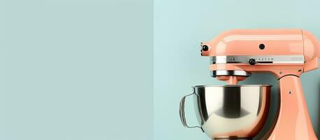 Photo of a pink mixer on a table with plenty of space for copy with copy space