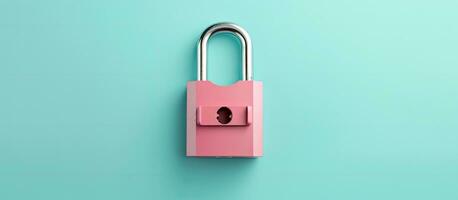 Photo of a vibrant pink padlock on a contrasting turquoise background with empty space for text or design with copy space