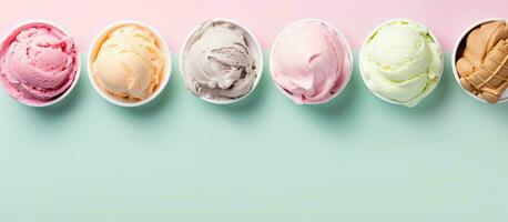 Photo of a colorful lineup of ice cream cones with various flavors with copy space