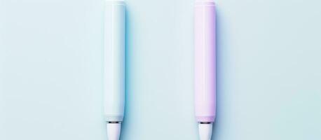 Photo of two pens side by side with empty space for text or design with copy space