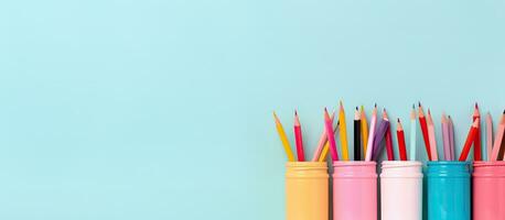 Photo of a colorful row of pencils with empty space for text or design with copy space