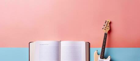 foto de un guitarra y libro en un mesa con vacío espacio para tu creativo pensamientos con Copiar espacio