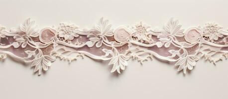 Photo of a detailed close up of a delicate lace border adorned with intricate floral patterns with copy space