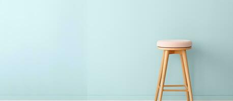 Photo of a wooden stool against a blue wall with empty space for text or design with copy space