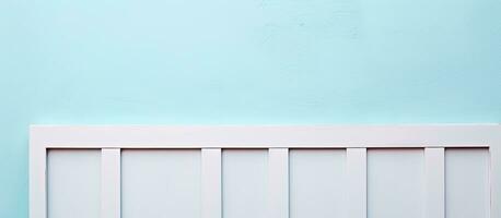 Photo of a tan jacket hanging on a wall with ample copy space with copy space