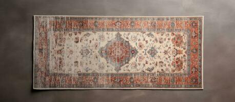 Photo of a decorative rug hanging on a wall, creating a unique focal point in the room with copy space