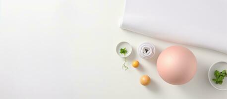 Photo of a white table with a vibrant display of eggs and oranges with copy space