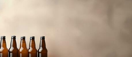 Photo of a row of beer bottles on a table with empty space for text or design with copy space