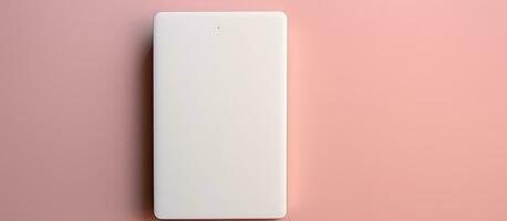 Photo of a minimalist white wall mounted object on a vibrant pink wall with copy space