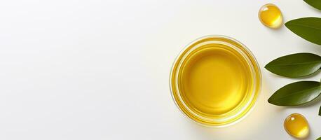 Photo of a bottle of olive oil with fresh olives on a wooden background with copy space