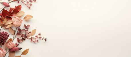 foto de hermosa rosado flores y hojas en un limpiar blanco antecedentes con Copiar espacio
