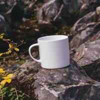 Mockup of a white mug on nature background photo