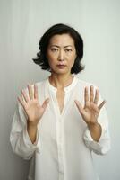 Studio shot of asian woman dynamic emotional gestures AI Generative photo