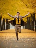 foto de emocional dinámica actitud asiático hombre en otoño ai generativo