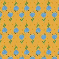 Blue flowers isolated on yellow background. Hand drawn tulip floral seamless pattern vector illustration.