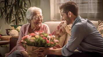 AI Generative Joyful bonding middle aged senior woman feeling excited getting wrapped gift box and flowers from young smiling grownup son sitting together on cozy couch birthday or special occasion ce photo