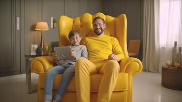 AI Generative Smiling young father and little son sit relax on couch in living room have fun using cellphone together Happy dad and small boy child rest on sofa at home watch funny video on smar photo