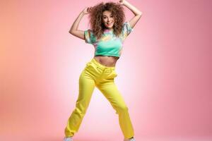 Dancing girl on pink background photo