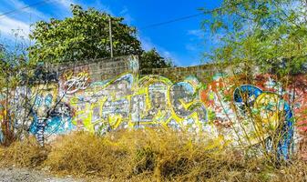 Puerto Escondido Oaxaca Mexico 2023 Wall with graffiti art drawings paintings in Puerto Escondido Mexico. photo