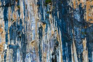 Rock cliff wall texture limestone islands Koh Phi Phi Thailand. photo