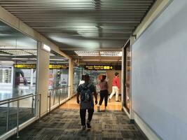 Bangkok, Thailand on July 8, 2023. Hallway or hall leading to the visa counter on arrival, immigration and transfer to domestic. photo