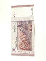 Isolated white photo of one piece of 100 ringgit malaysian bank notes