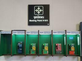 Bangkok, Thailand on May 21, 2023. Public telephones located at Don Mueang International Airport photo