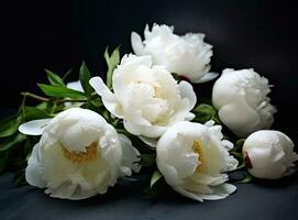 Fresh white peony flowers on dark table background. Condolence card. Empty place for emotional, sentimental text, quote or sayings. Closeup. Created with Generative AI technology. photo