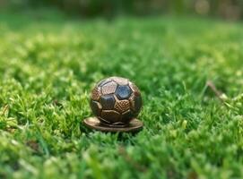 Trophy of the FIFA World Cup on the green grass of the football field. Created with Generative AI technology. photo