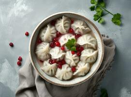 dumplings with cherries, Pierogi, varenyky, vareniki, pyrohy on a light background, banner, menu, recipe place for text, top view. Created with Generative AI technology. photo