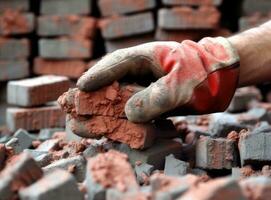 Close up of industrial bricklayer installing bricks on construction site. Created with Generative AI technology. photo