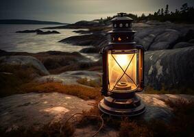 Old kerosene lantern with warm yellow light on a bridge by a lake in the evening.  The light of the sun reflecting the water through the lamp. Created with Generative AI technology. photo