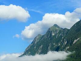 Landscape of mountains covered with white clouds. Doi Laung Chiang Dao, a famous tourist destination in Chiang Mai, Thailand photo