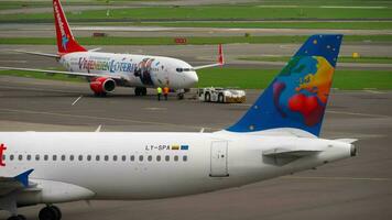 AMSTERDAM, THE NETHERLANDS JULY 29, 2017 - SmallPlanet Airlines Airbus A320 LY SPA taxiing after landing, flight CND620 from Rhodos, Shiphol Airport, Amsterdam, Holland video