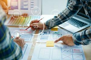 UX graphic designer planning application process development prototype wireframe for web smart phone. Creative digital development agency. photo