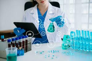 Dctor work on digital tablet healthcare doctor technology tablet using computer  in laboratory study with virtual icon photo