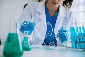 Dctor work on digital tablet healthcare doctor technology tablet using computer  in laboratory study with virtual icon photo