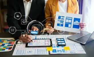 UX graphic designer planning application process development prototype wireframe for web smart phone. Creative digital development agency. photo