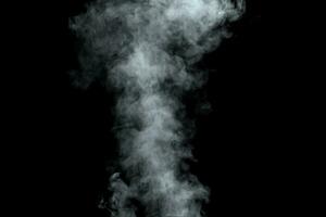 Abstract  powder or smoke isolated on black background photo