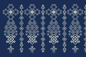 Ethnic geometric fabric pattern Cross Stitch.Ikat embroidery Ethnic oriental Pixel pattern blue background. Abstract,vector,illustration. Texture,clothing,frame,decoration,motifs,silk wallpaper. vector