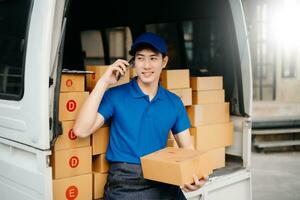 Portrait of courier delivery Asian man searching the address on digital tablet. Delivery service, delivery home and shipping concept. photo