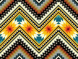 The geometric ethnic pattern of traditional style. Navajo, America Indian patterns. Design for background, wallpaper, clothing, wrapping, Batik, fabric, and prints. Vector illustration.