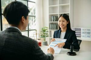 Business and Male lawyer or judge consult having team meeting with client, Law and Legal services concept.Customer service good cooperation in office photo