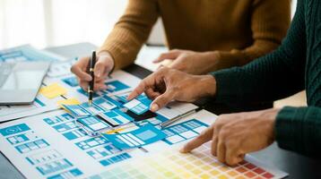 UX graphic designer planning application process development prototype wireframe for web smart phone. Creative digital development photo