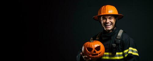 Firefighter with a Halloween pumpkin on a solid background with empty space for text photo