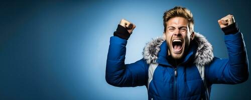 Icelandic football fan celebrating a victory on blue and white background with empty space for text photo